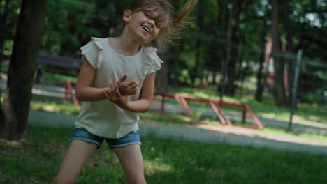 caucasian girls running and playing at playground.