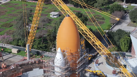 close up of nose of space shuttle endeavour external tank with scaffolding, aerial