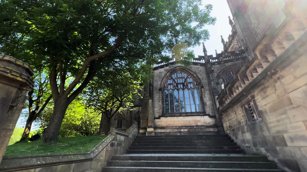 Manchester Cathedral Building Clock Tower Exterior with Sun Flare