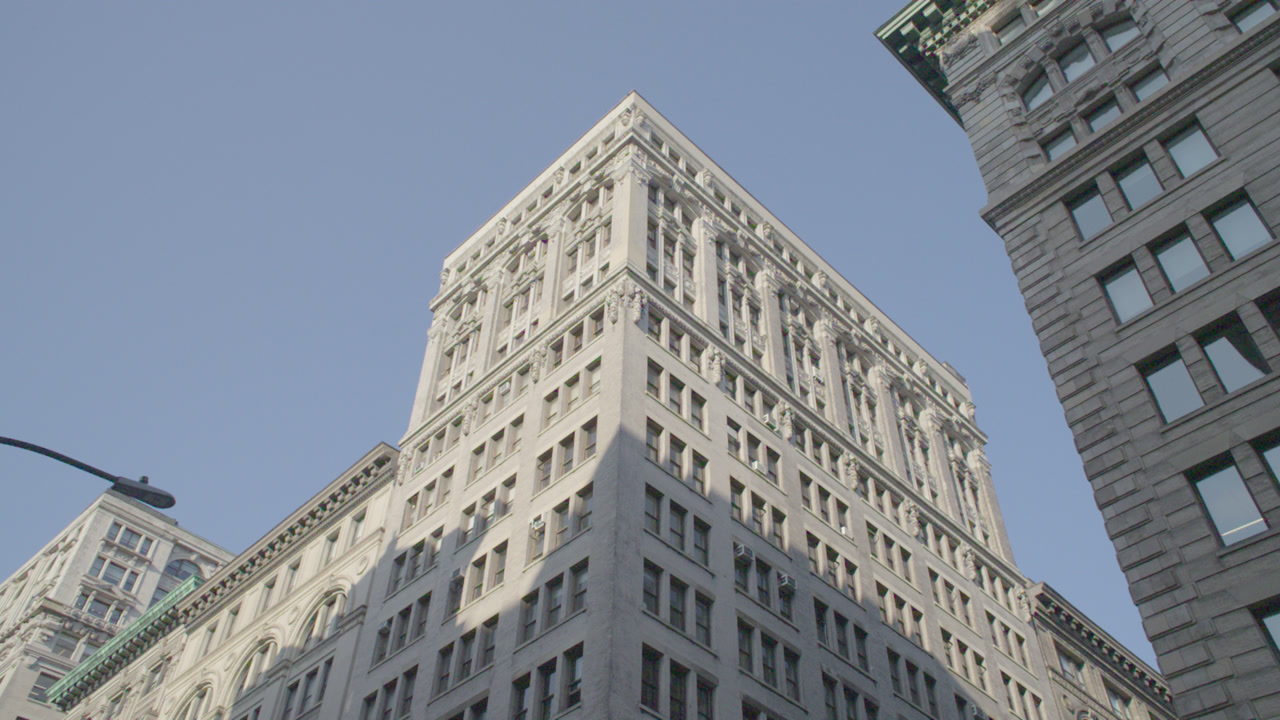 Establishing shot of a Building Exterior in Midtown Manhattan. Shot on a summer morning in New York City.