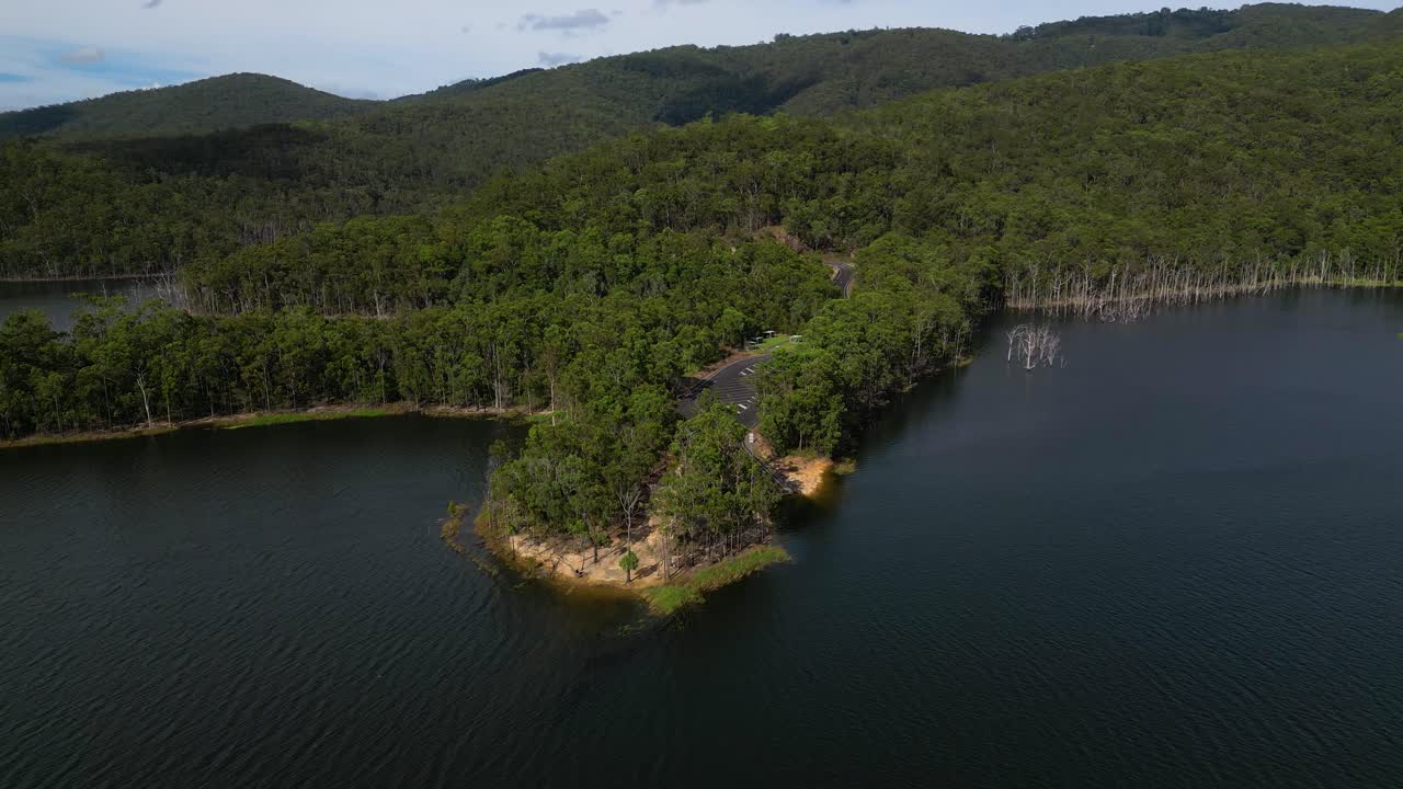Left to right aerial views of Advancetown Lake near the Western Boat Ramp on the Gold Coast Hinterland.