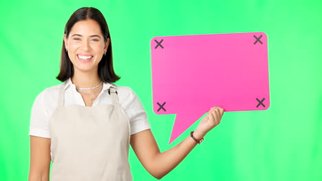 woman holding a pink speech bubble