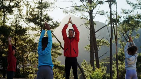 trainer and kids performing yoga 4k