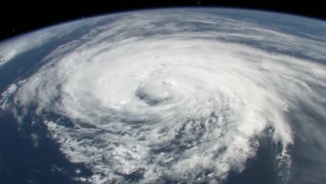 shots of the earth from space including a large storm