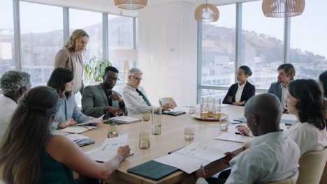 beautiful business woman team leader discussing creative ideas with shareholders briefing colleagues sharing company development strategy in office boardroom meeting 4k