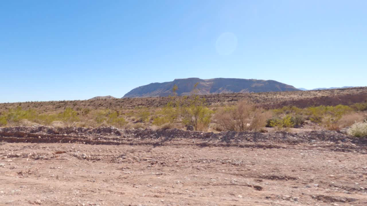 Moving By A Desert Mountain