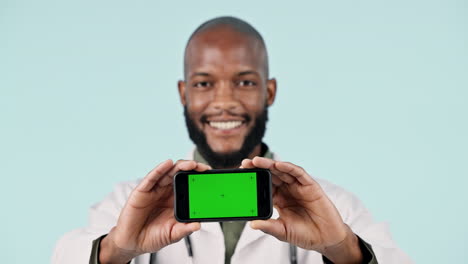 Green-screen,-phone-and-doctor-with-face-of-black