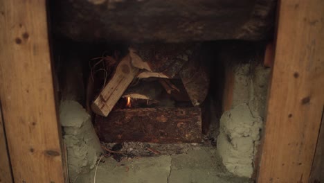 firewood under diy hot tub outdoors - close up