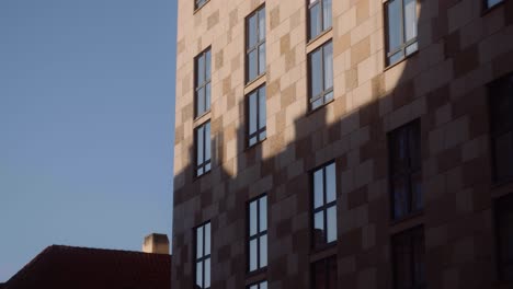 Distinctive-architecture-of-buildings-in-Prague,-Czech-Republic,-tilt-up-shot