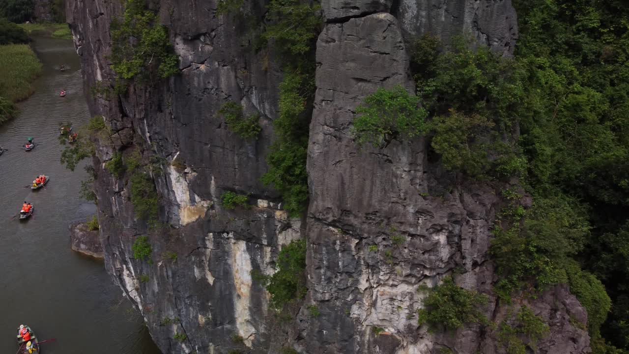 Aerial View of Ha Long Bay, Vietnam: Kayaking Tours through Stunning Limestone Cliffs and Lush Jungle