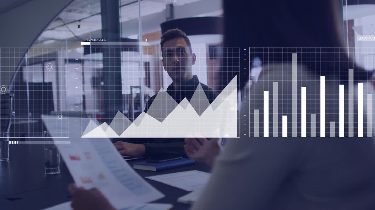 Business meeting with charts and graphs animation over office setting