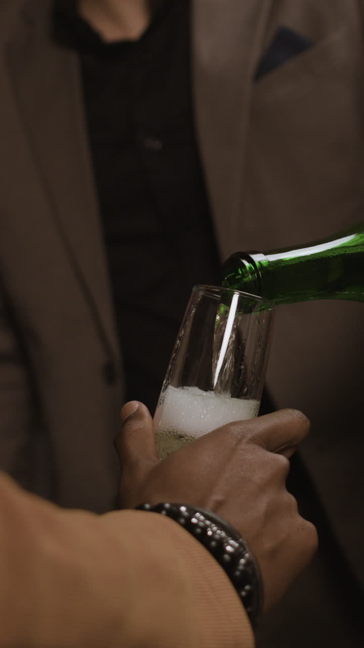 Pouring Champagne for a Celebration