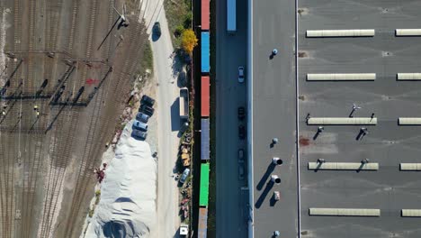 aerial view of shipping containers, semi trucks cargo distribution of containers