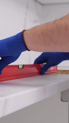 installing a marble countertop with a level