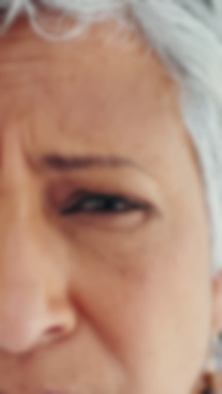 Close-up of a woman's face with glasses