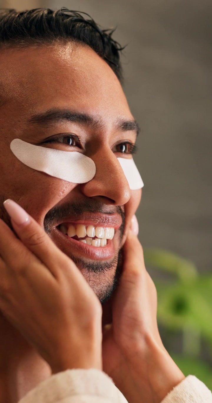 Man Applying Under-Eye Patches for Skincare Routine