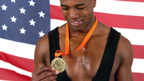 man holding medal