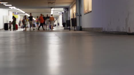 passengers changing platforms in an underpass to catch the train, stabilized.