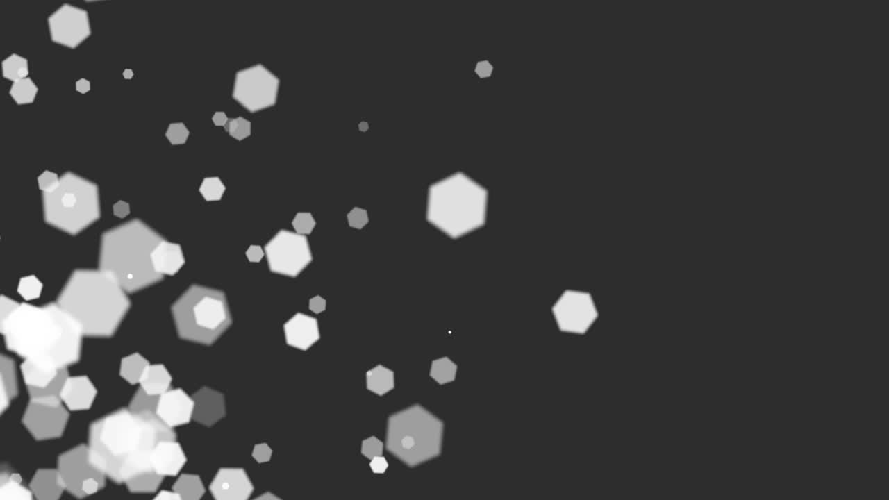 애니메이션은 추상 흰색 보케와 반짝이는 배경의 입자를 날립니다 새해 복 많이 받으세요 그리고 메리 크리스마스 테마