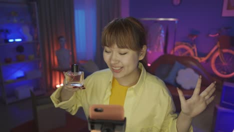 woman reviewing perfume online