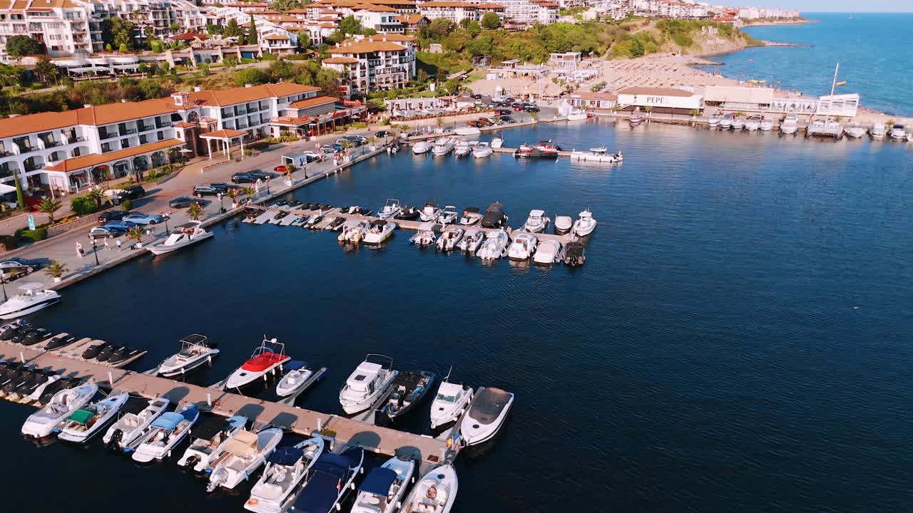 Aerial view of marina and yachts in Sveti Vlas, Bulgaria. Aerial drone shot of harbor with yachts and boats docked at Sveti Vlas resort on the Black Sea coast