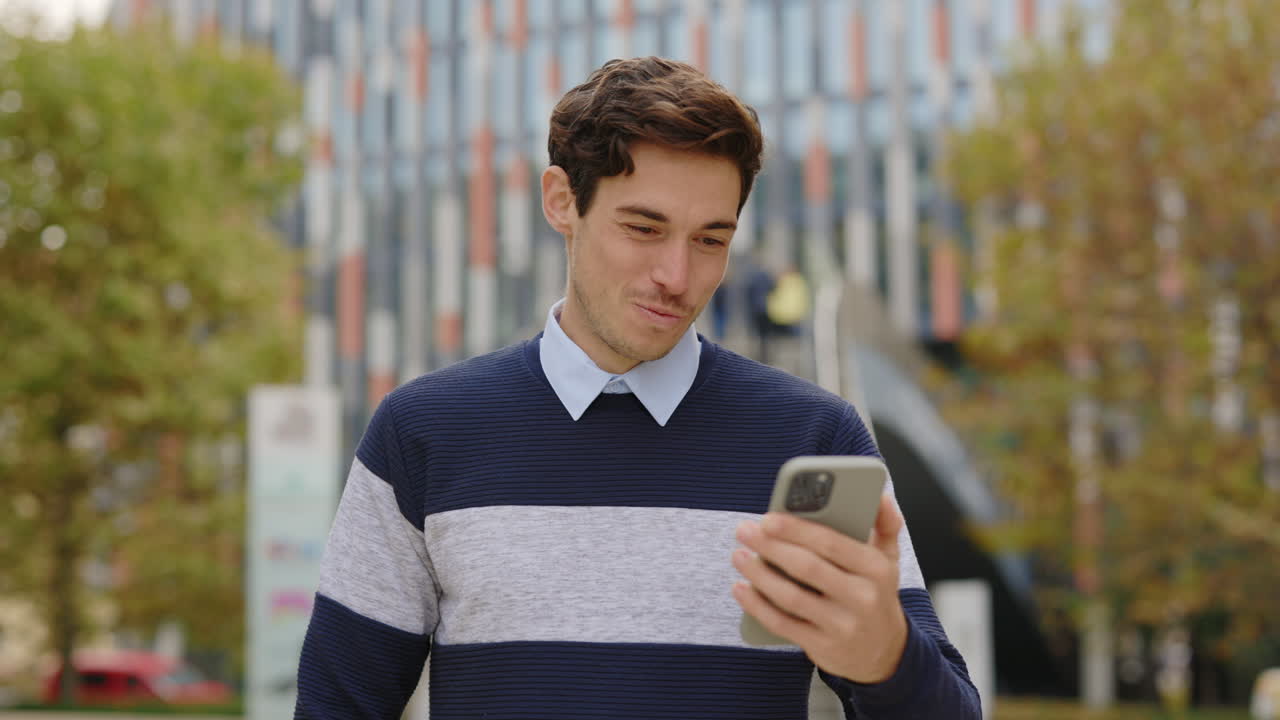 Man using his phone outdoors
