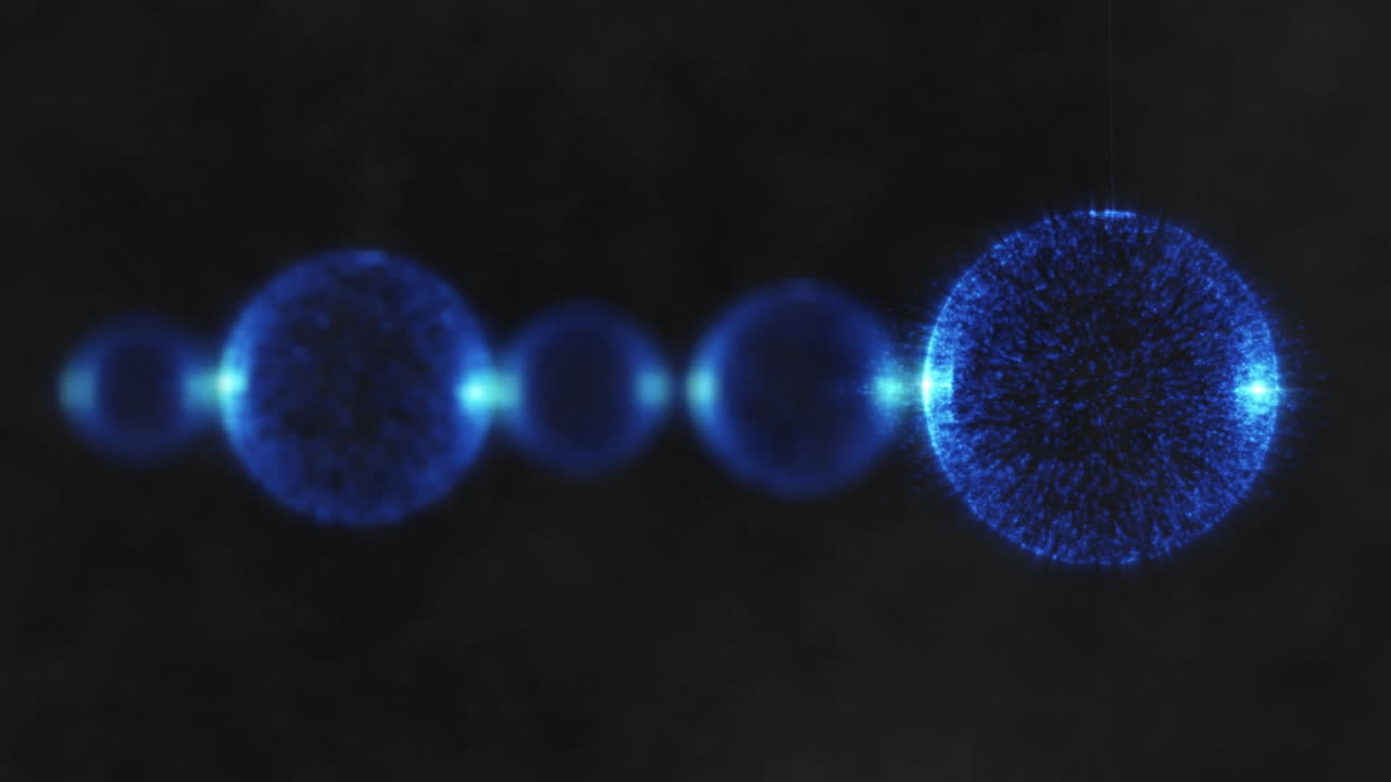 검은 바탕에 떠다니는 반 ⁇ 이는 파란색 구의 애니메이션