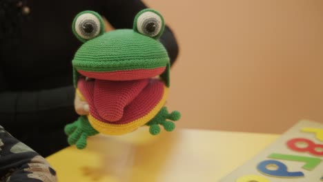 plush frog puppet for speech therapy