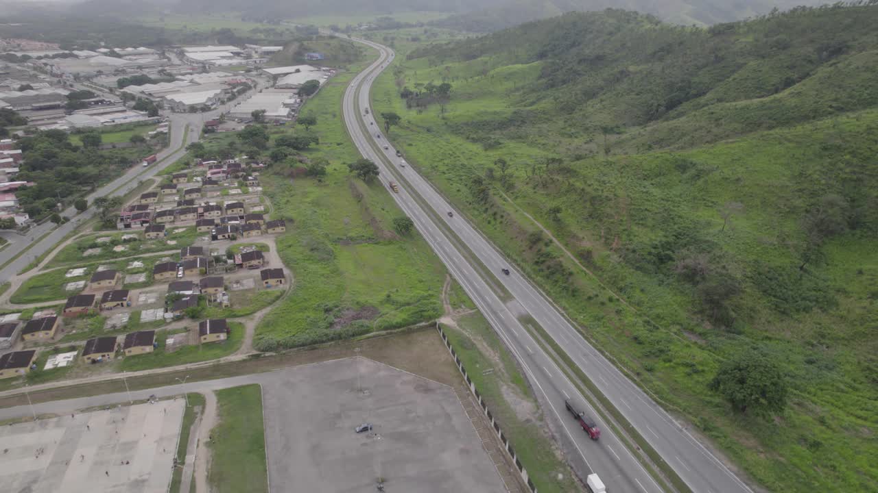 Aerial view of highway through green hills, La Victoria, Venezuela