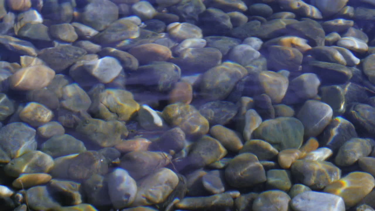 Smooth Stones Under Clear Water