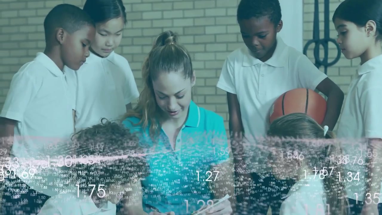 Teacher tapping tablet after data overlay recedes in gym, guiding students through waveforms