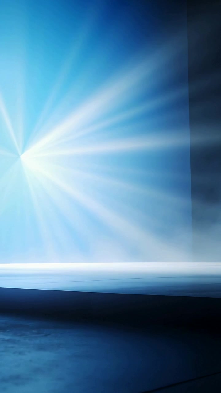 Vertical video: Appearing light point casting beams across stage, lighting haze and floor for show