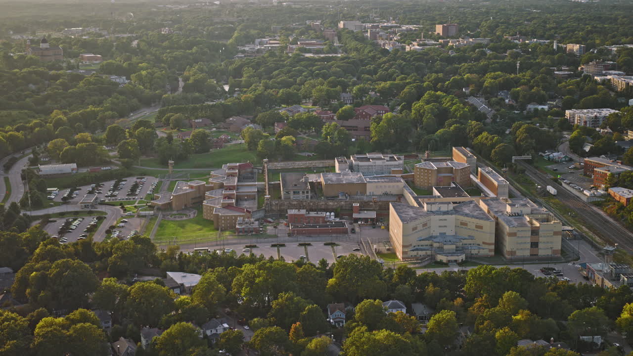 Raleigh North Carolina Aerial v23 birds eye view drone flyover Boylan Heights, soaring around the fortified perimeter of Central Prison at sunset - Shot with Inspire 3 8k - Sept 30th 2023