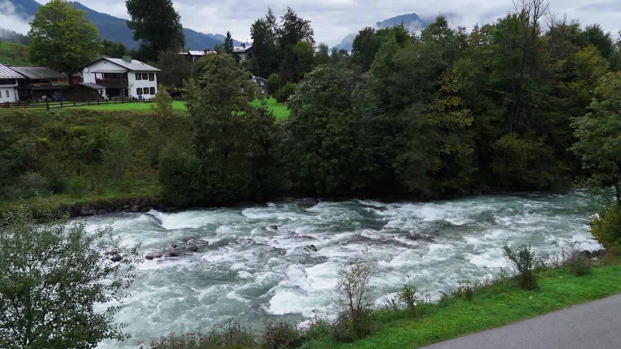 Aerial view of königsseer ache rise and pan down