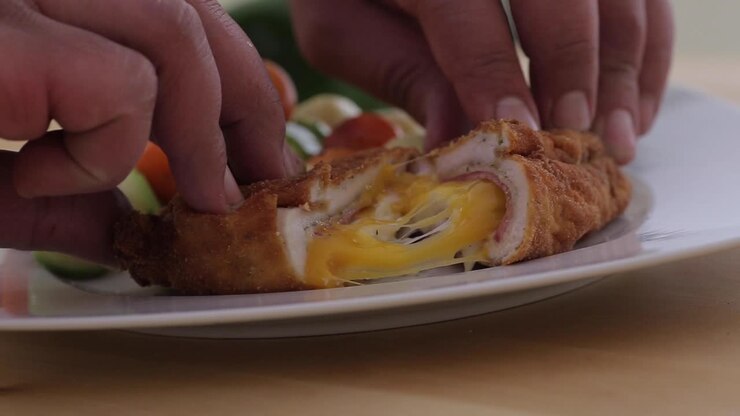 melted cheese fall out of cooked chicken fired breast