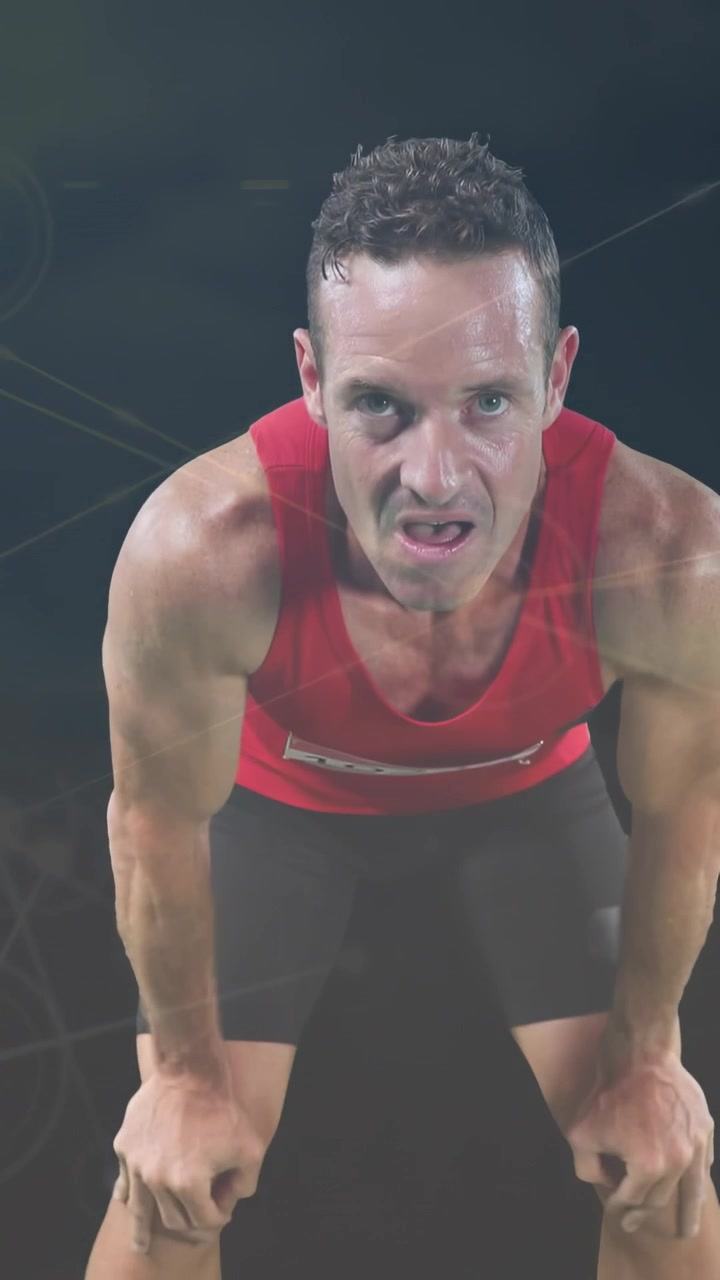Video vertical: Atleta recuperándose después del entrenamiento, tocándose la cabeza, recuperando la concentración, mostrando HUD deportivo