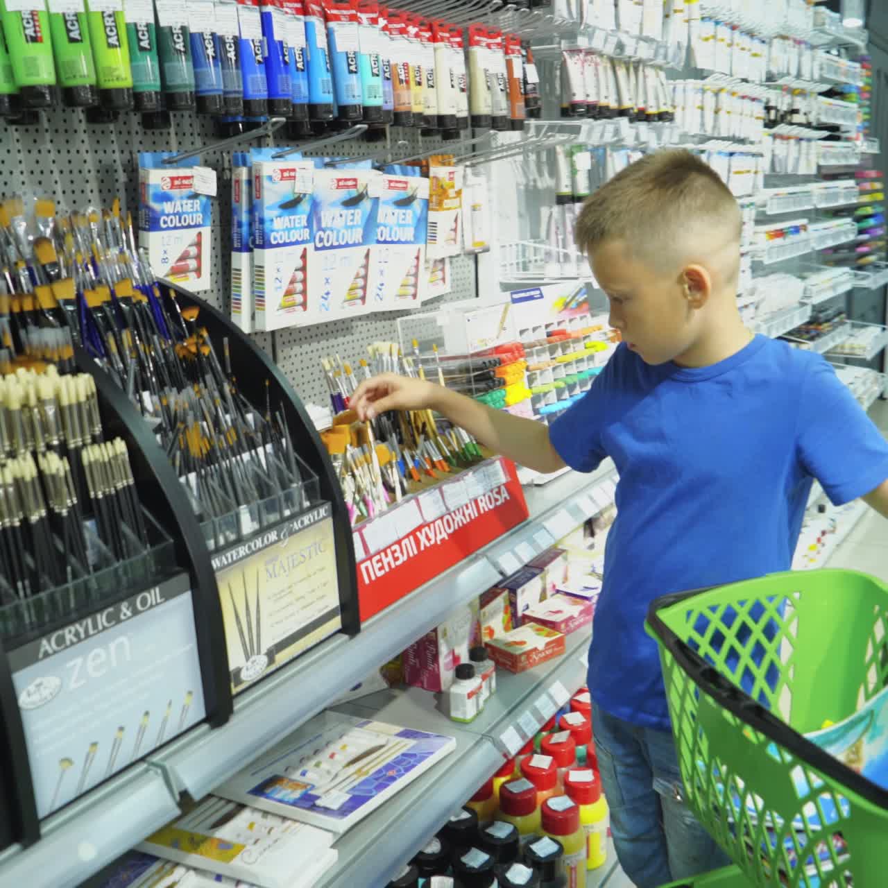 VINNITSA, UKRAINE - AUGUST 20, 2018: Buying school supplies at the supermarket. School goods in the store.