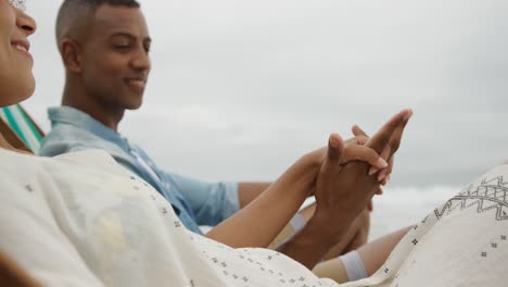 couple enjoying free time by the sea