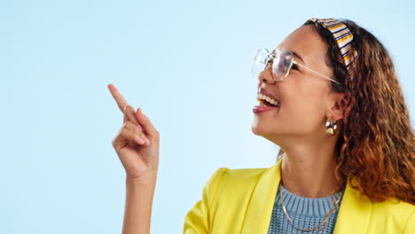 glasses, smile and woman pointing to space