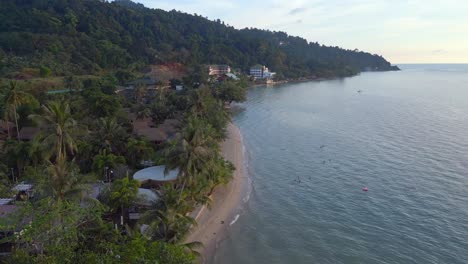 Marvelous-aerial-top-view-flight-Sex-tourism-prostitution-pensioner-paradise-island-Thailand-Koh-Chang-Kai-Bae-Beach-evening-22