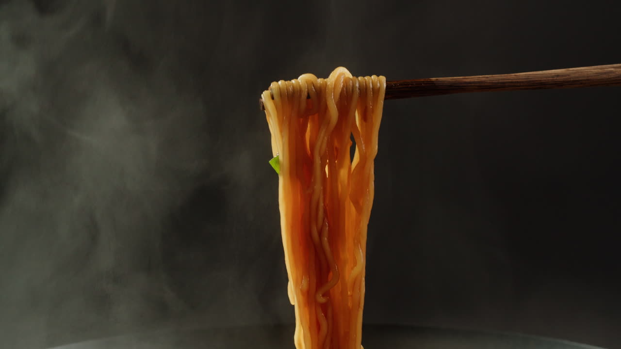 Hot Ramen Noodles Being Eaten