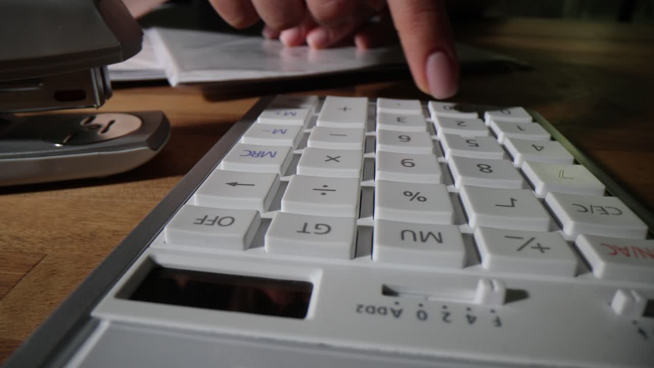 Calculator with finger pressing number