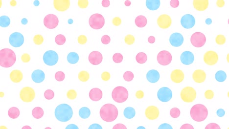 pastel polka dots floating on a white background.