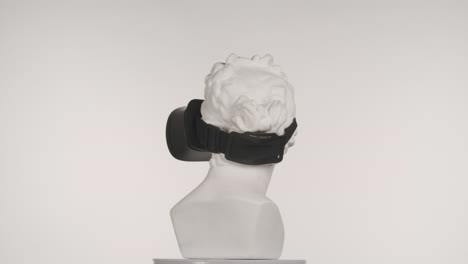vr headset on a classical sculpture