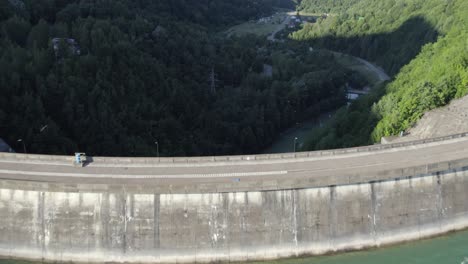 Beautiful-shot,-drone-over-a-concrete-dam-in-Romania