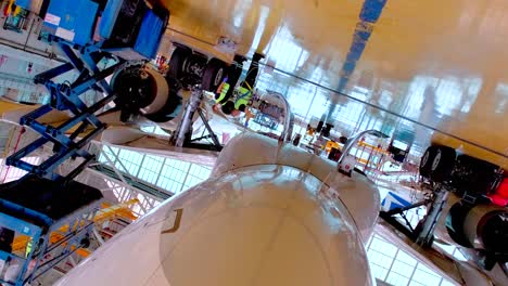 workers cleaning outside of the plane , airplane , airport