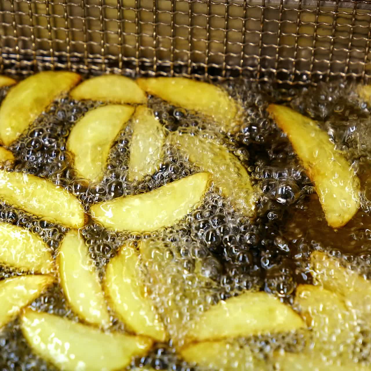 Fries fried in oil at restaurant