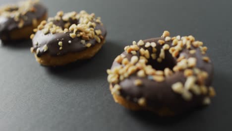 Video-of-donuts-with-chocolate-on-grey-background