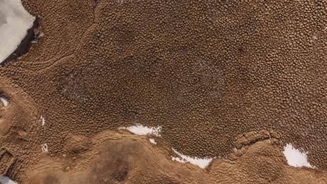 fast-moving aerial view over a volcanic crater in skútustaðir near lake mývatn, reykjahlíð, iceland.