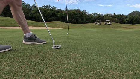 golfer practicing swing on a sunny day